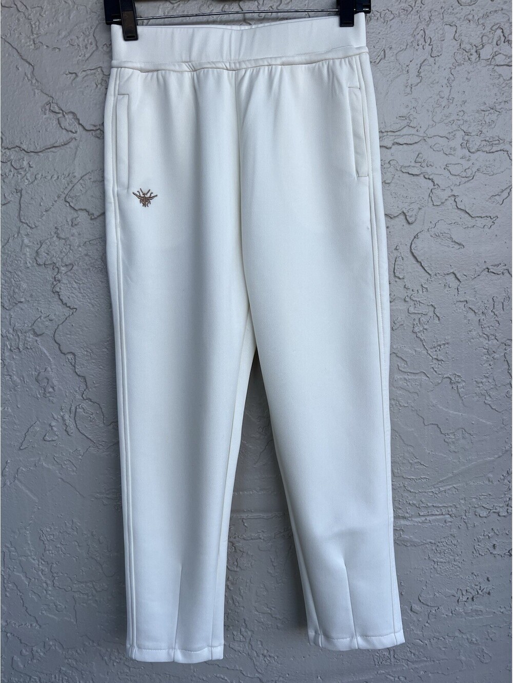 off white sportswear track pants with a small bee logo Size S.